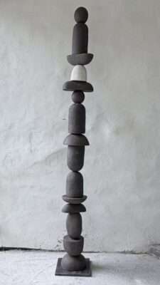 Vertical totem sculpture in black