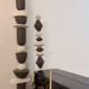 Set of vertical totem sculptures in black & white