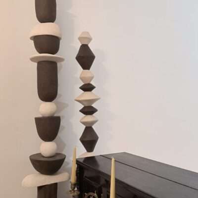 Set of vertical totem sculptures in black & white